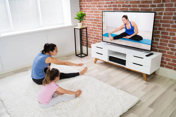 Fit Family Doing Home Online Yoga Fitness Exercise
