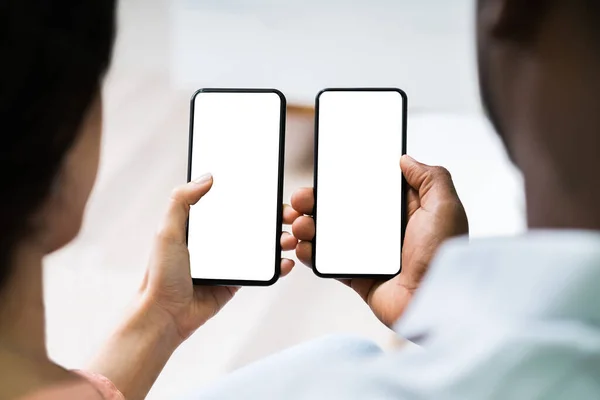 Close Mature Couple Holding Mobile Phones Blank Screen — Stock Photo, Image