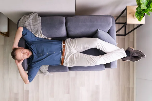 Retrato Del Hombre Cansado Durmiendo Sofá —  Fotos de Stock