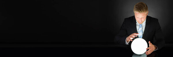 Psychic Predicting Future Using Crystal Ball. Business Visionary