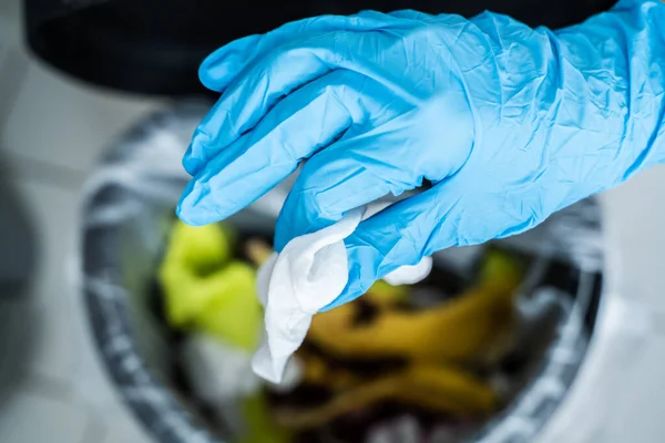 Hand Glove Throwing Away Dirty Sanitizing Wipe — Stock Photo, Image