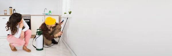 Pest Control Exterminator Spraying Insecticide Windowsill — Stock Photo, Image