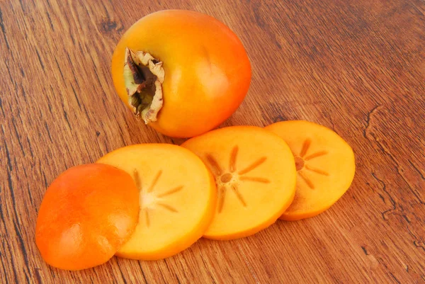 Persimmon Fruit Slices Table — Stock Photo, Image