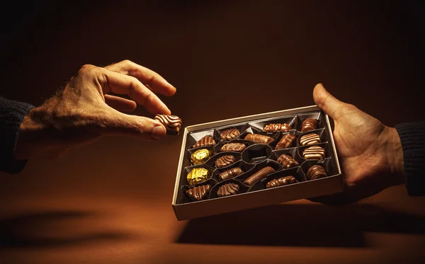 Box Chocolates in Hands — Stock Photo, Image