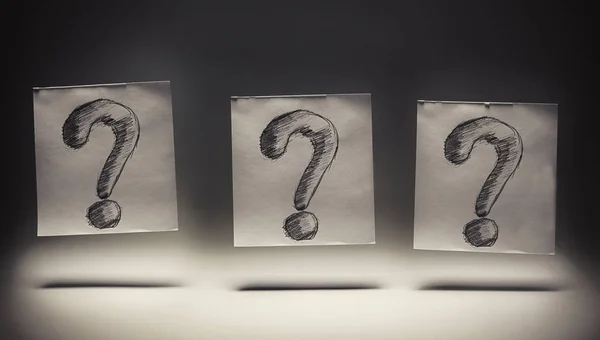Three Question Marks on Papers — Stock Photo, Image