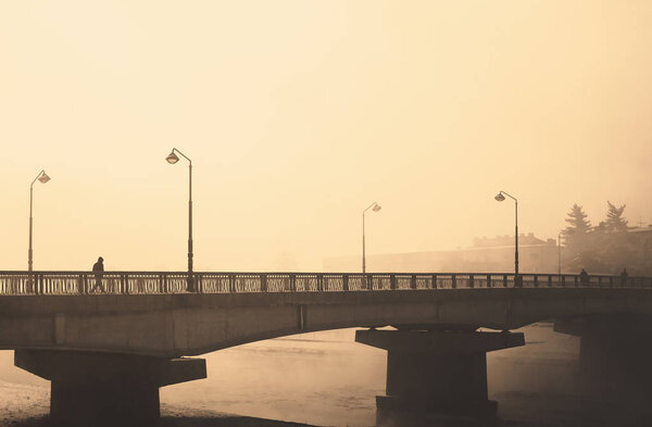 Через мост.
 