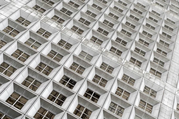 Background of white business building facade in La Defense district, Paris, France.