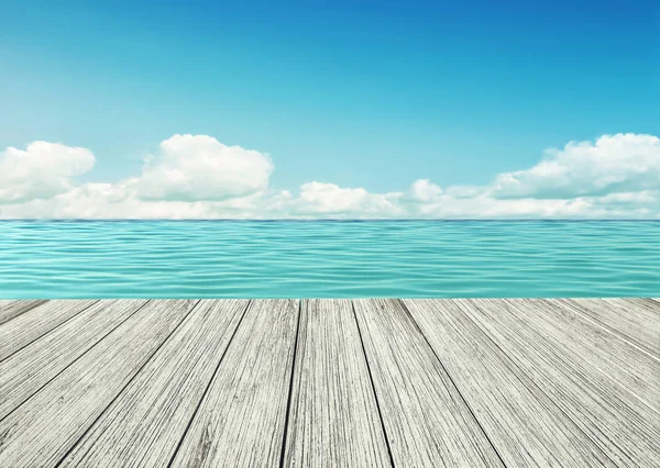 Holztisch, Holzboden am Meer — Stockfoto