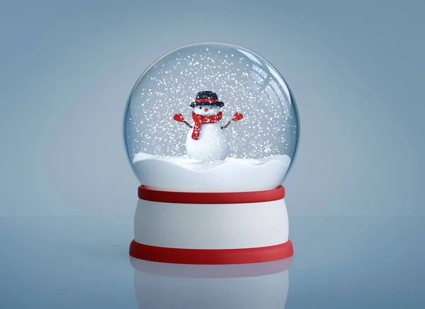 Boule à neige avec bonhomme de neige sur fond bleu — Photo