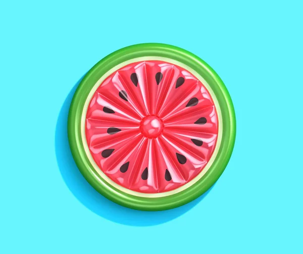 Inflatable watermelon slice isolated on blue background — 스톡 사진