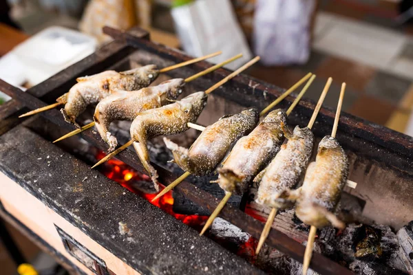 Fish Ayu with salt being charcoal broiled — Stock Photo, Image