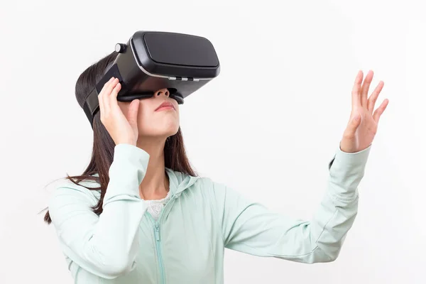 Woman using VR device and hand touch on air — Stock Photo, Image