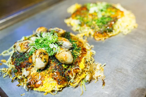 Okonomiyaki Japanese hot plate pizza — Stock Photo, Image