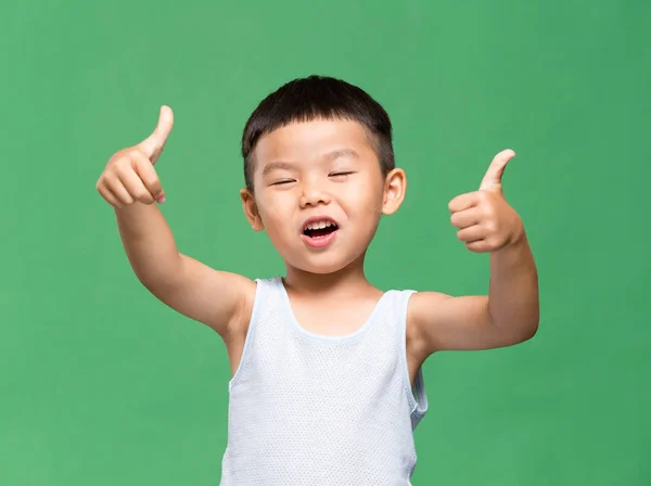 Roztomilé dítě ukazuje palec — Stock fotografie