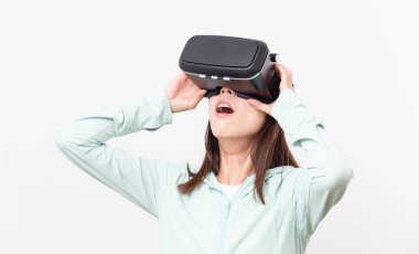 woman looking though the Virtual reality glasses clipart