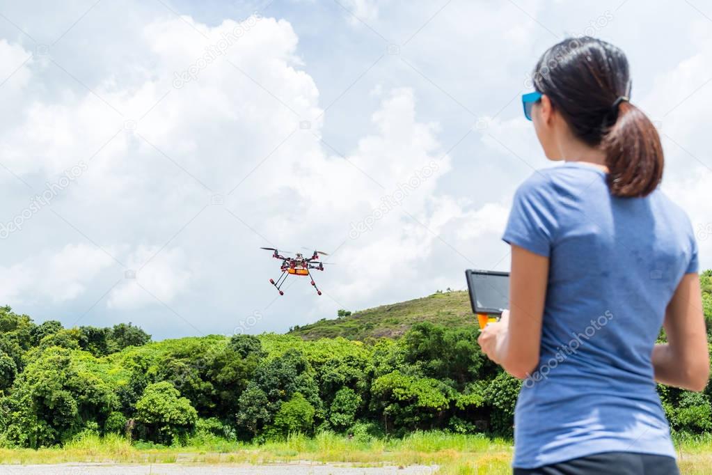 Woman control with drone