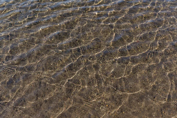 Las olas del lago en aguas claras —  Fotos de Stock