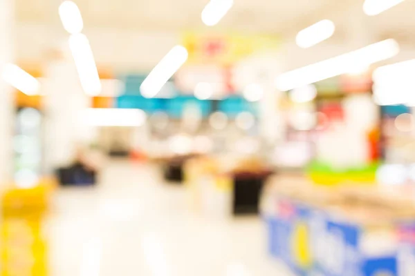 Étagères de supermarché fond flou — Photo