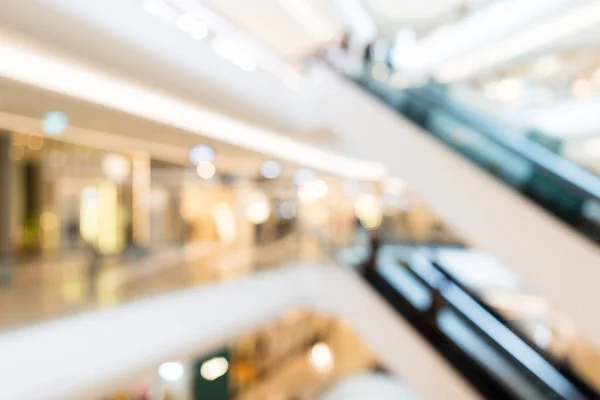 Imagem turva de shopping center e pessoas — Fotografia de Stock