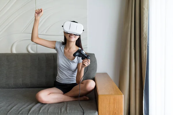 Woman play game with virtual reality device