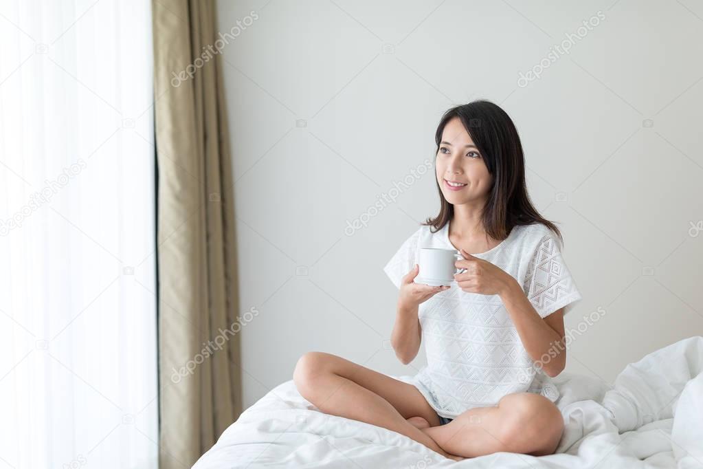 Woman enjoy her morning coffee