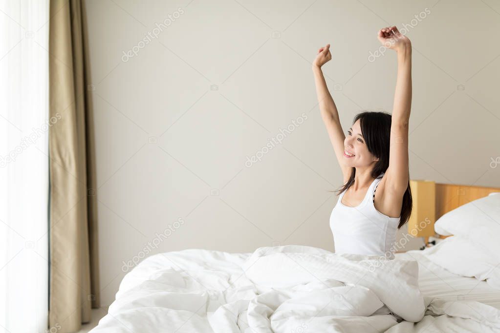 Woman stretching in the morning 