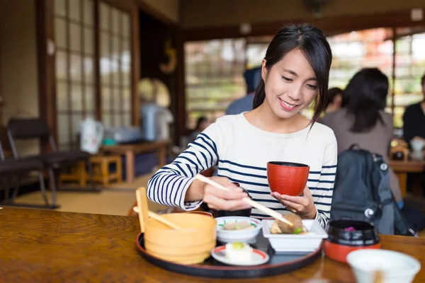 Woman having lunch in restaurant — Stock Photo, Image