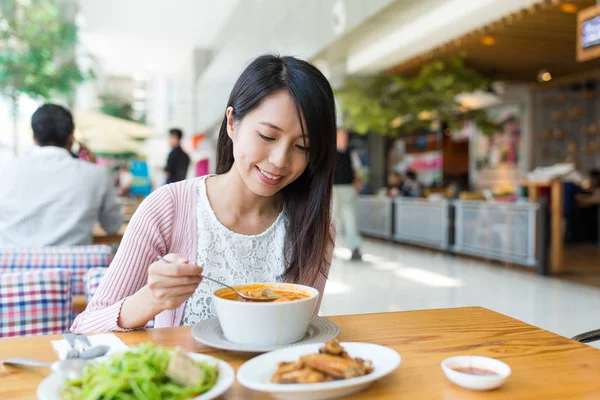 Woman enjoy her food at restaurant — Stock Photo, Image