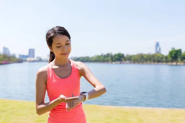 Sport woman using smart watch