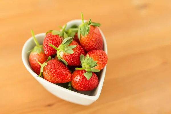 Fresh Strawberry in heart shape bowl — Stock Photo, Image