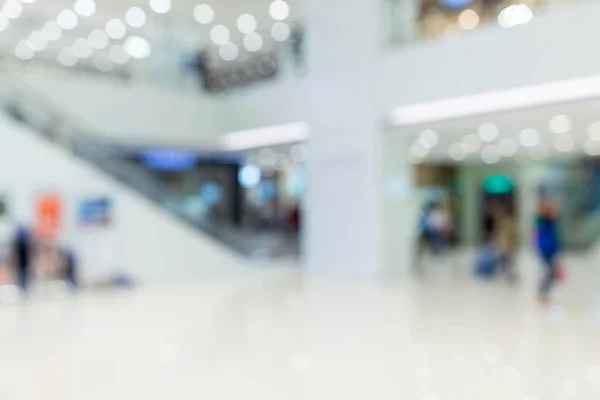 Blurred image of shopping mall and people — Stock Photo, Image