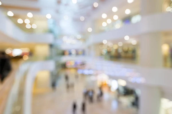 Wazig beeld van winkelcentrum en mensen — Stockfoto