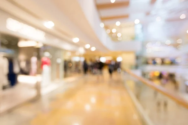 Blurred image of people in shopping mall — Stock Photo, Image