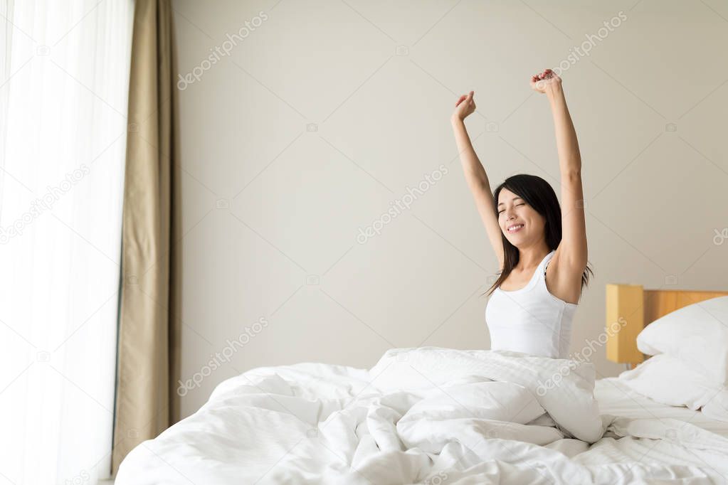 Woman wake up at morning