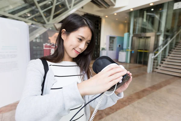 Woman trying on vr device