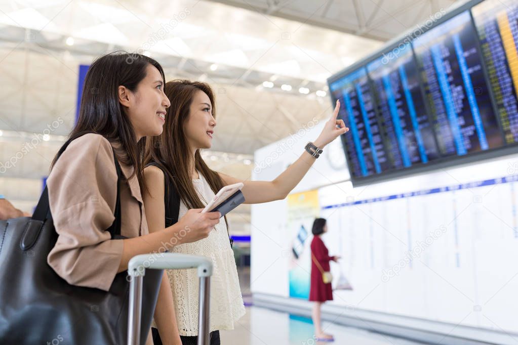 Friends go for travel at airport 