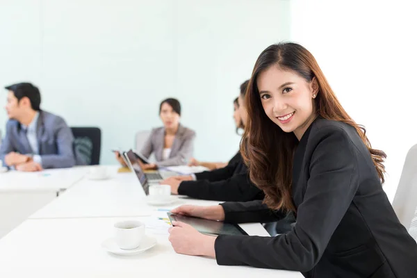 Asian businesswoman in conference room