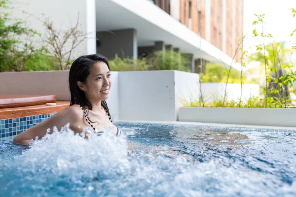 Woman enjoy in jacuzzi pool