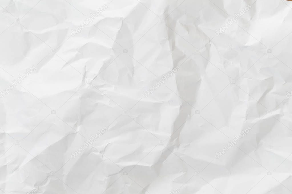 Crumpled white paper background 