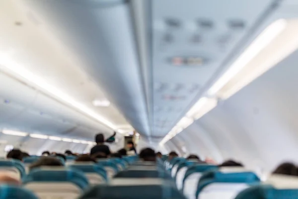 Interior del avión con personas dentro — Foto de Stock