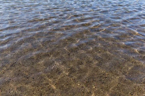 Dalgalanma su dalgaları ile — Stok fotoğraf
