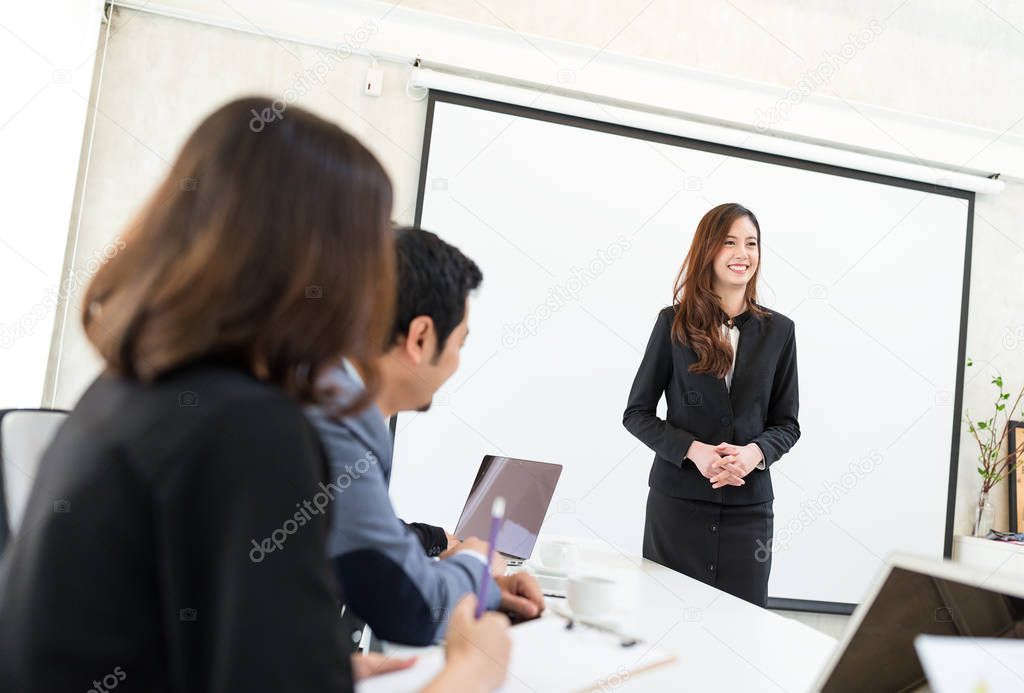 Businesswoman present her project inside meeting room