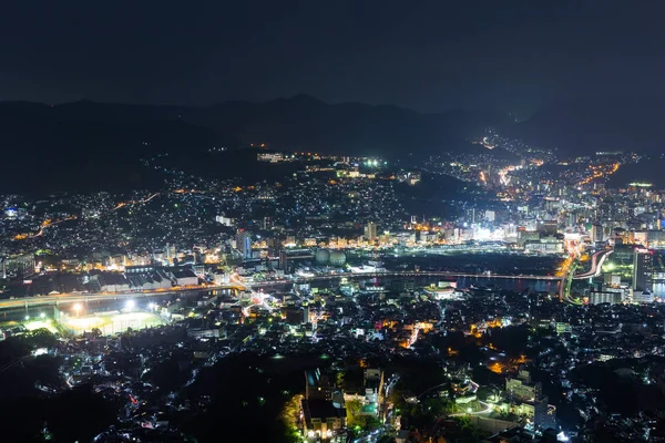Nagasaki skyline in de nacht — Stockfoto