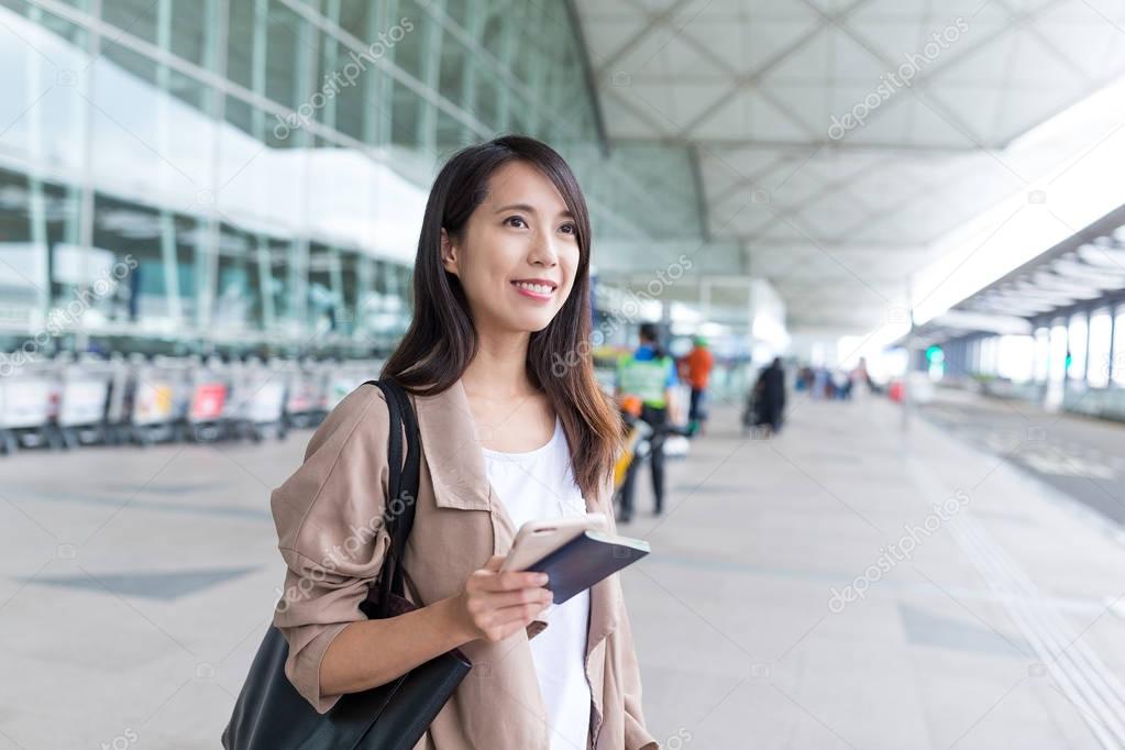 Woman go travel in airport