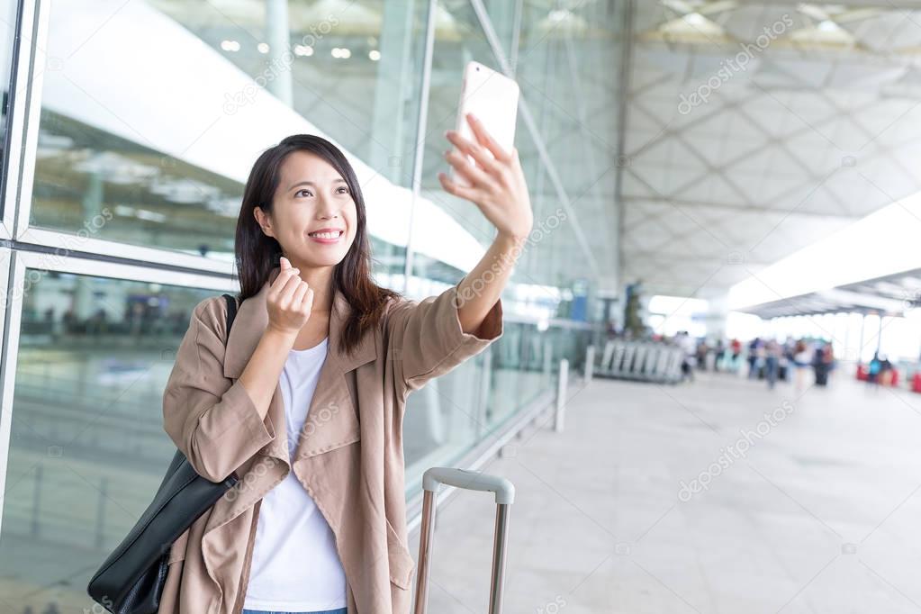 Woman go travel and taking selfie 