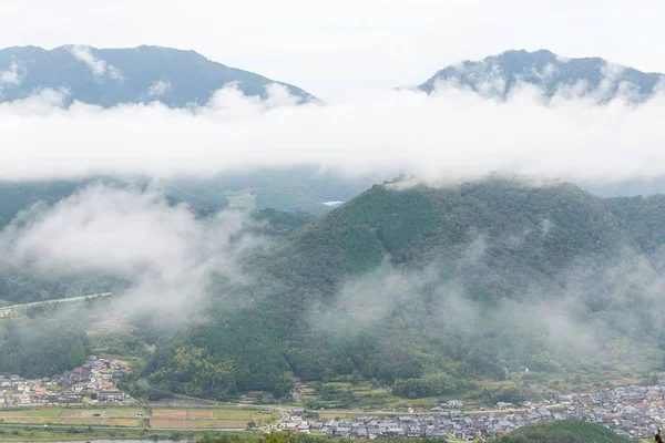 Sea of cloud in the mountain and village — Stock Photo, Image