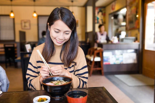 Woman having udon — Stock Photo, Image