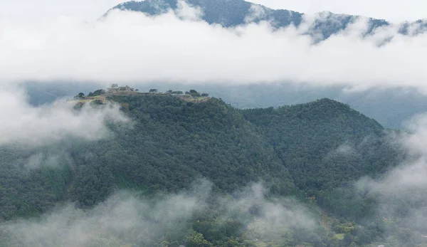 Takeda Castle and clouds in mountains — Stock Photo, Image