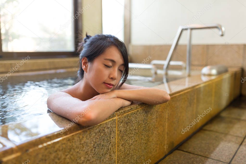 Woman enjoy hot bath