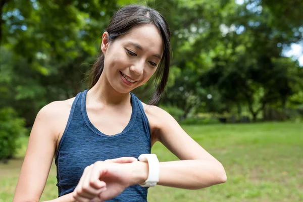 Sport woman using smart watch